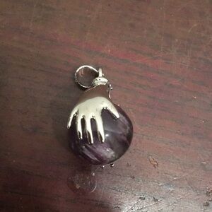 Silver Hand Wrapped Carved Amethyst Crystal Pendant